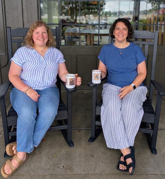 Two moms on the porch